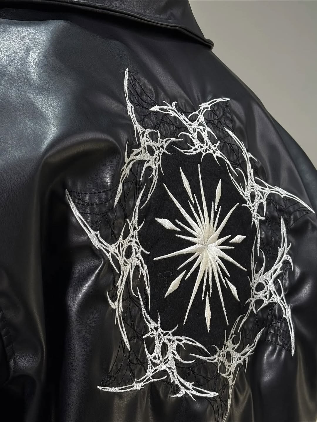 Dark star embroidered leather jacket