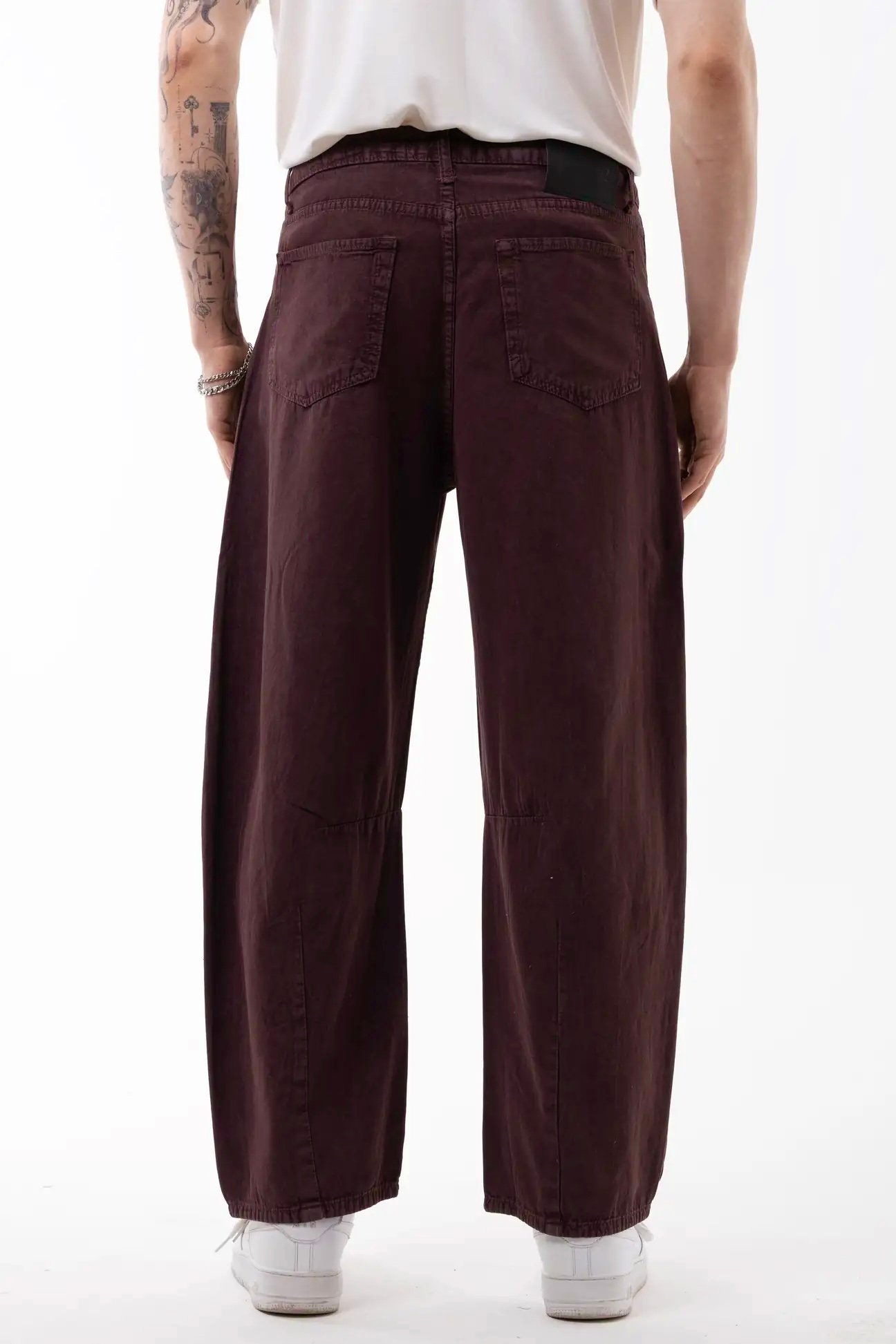 Faded burgundy acid-washed gabardine pants