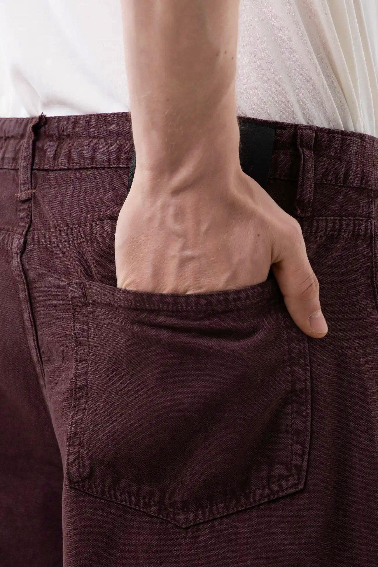 Faded burgundy acid-washed gabardine pants